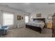Cozy Primary bedroom with vaulted ceiling, large bed, soft carpet, and natural light creates a peaceful retreat at 80 Westbrook Ln, Franklinton, NC 27525