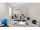 Home gym featuring modern workout equipment, providing a convenient space for fitness activities at 804 Cambridge Hall Loop, Apex, NC 27539