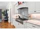 Modern gourmet kitchen featuring stainless steel appliances and designer finishes at 804 Cambridge Hall Loop, Apex, NC 27539