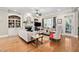 Bright living room with hardwood floors, fireplace and large windows at 804 Cambridge Hall Loop, Apex, NC 27539