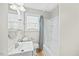 Bathroom featuring a bathtub, and vanity with an integrated sink at 818 Eastern Ave, Rocky Mount, NC 27801