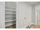 Utility room features built-in shelving to maximize space and improve organization at 818 Eastern Ave, Rocky Mount, NC 27801