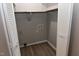 Well lit utility closet with shelving and vinyl flooring at 107 Ware Ct, Garner, NC 27529