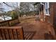 Spacious back deck with wood railings, perfect for outdoor gatherings and relaxation at 107 Ware Ct, Garner, NC 27529