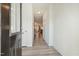 Inviting entryway with sleek gray floors and an abundance of natural light filtering through the front door at 116 Polaris Ave, Garner, NC 27529