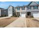 Charming townhome exteriors featuring diverse architectural designs and well-maintained landscaping at 116 Polaris Ave, Garner, NC 27529