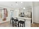 Stylish kitchen with granite countertops, stainless steel appliances, pendant lighting, and a breakfast bar at 116 Polaris Ave, Garner, NC 27529
