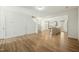 Expansive living room with new flooring, neutral walls, and easy access to the kitchen and staircase at 116 Polaris Ave, Garner, NC 27529