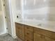 A bathroom with double sinks, vanity and custom cabinets at 141 Noramac Ct, Selma, NC 27576