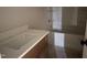 Bathroom featuring a shower and tub combination with a vanity and sink at 141 Noramac Ct, Selma, NC 27576
