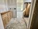 New cabinets line the hall, creating an unfinished pantry near the intersection of hallways at 141 Noramac Ct, Selma, NC 27576