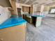 A kitchen island featuring modern countertops, perfect for food preparation at 141 Noramac Ct, Selma, NC 27576