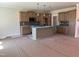 A modern kitchen with an island, stainless steel appliances, and pendant lighting at 141 Noramac Ct, Selma, NC 27576