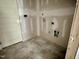 Large laundry room with connections, ready for appliances and finishing at 141 Noramac Ct, Selma, NC 27576