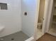 Modern shower with a built in seat and gold fixtures at 141 Noramac Ct, Selma, NC 27576