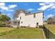 Exterior home view with a large backyard, fence and covered porch at 154 Ashton Ln, Angier, NC 27501