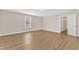 The bedroom is bright with hardwood floors and a large window, creating a great space at 154 Ashton Ln, Angier, NC 27501