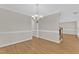 Refined dining room offering generous space, complemented by exquisite hardwood floors, enhancing its allure at 154 Ashton Ln, Angier, NC 27501
