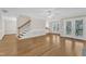 Spacious living area boasting sleek hardwood floors and seamless access to the outdoor area at 154 Ashton Ln, Angier, NC 27501