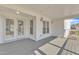 Comfortable screened porch with white siding and gray floors at 154 Ashton Ln, Angier, NC 27501