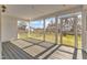 Relaxing screened-in porch with views of the manicured backyard at 154 Ashton Ln, Angier, NC 27501