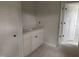 Bathroom vanity with white cabinetry and modern sink, located by closet at 163 Noramac Ct, Selma, NC 27576