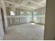 Unfinished living room with lots of natural light and multiple windows at 163 Noramac Ct, Selma, NC 27576