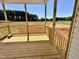 Covered porch overlooking a spacious backyard at 163 Noramac Ct, Selma, NC 27576