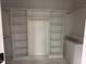 Organized walk-in closet with custom shelving and ample storage space at 163 Noramac Ct, Selma, NC 27576