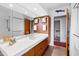 Modern bathroom boasting dual sinks, sleek countertops, and stylish fixtures at 1714 Park Dr, Raleigh, NC 27605