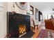 Modern fireplace with tile surround and decorative accents at 1714 Park Dr, Raleigh, NC 27605