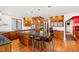 Spacious kitchen with wooden cabinets, stainless steel appliances, and a large center island with seating at 1714 Park Dr, Raleigh, NC 27605