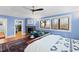 Cozy main bedroom with sitting area, fireplace, and large windows for natural light at 1714 Park Dr, Raleigh, NC 27605
