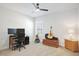 Bright bedroom with a ceiling fan, natural light, and neutral carpeting at 236 Annabelle Blue Dr, Wake Forest, NC 27587