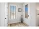 Bright foyer with a patterned glass door, stylish vase, and elegant rug at 236 Annabelle Blue Dr, Wake Forest, NC 27587