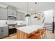 Well-equipped kitchen with a large island, stainless steel appliances, and ample cabinet space at 236 Annabelle Blue Dr, Wake Forest, NC 27587
