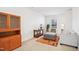 Bright living room with open floor plan, large windows, and a cabinet at 236 Annabelle Blue Dr, Wake Forest, NC 27587