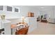 Comfortable loft area with desk, open layout, and natural light from multiple windows at 236 Annabelle Blue Dr, Wake Forest, NC 27587