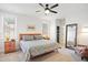 A well-lit main bedroom featuring a ceiling fan and light colored walls at 236 Annabelle Blue Dr, Wake Forest, NC 27587