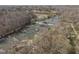 Scenic aerial view of the river, surrounded by wooded landscape during the day at 2409 Hodges Rd, Burlington, NC 27217