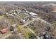 Overhead perspective of community and landscape showcasing buildings and surrounding nature at 2409 Hodges Rd, Burlington, NC 27217