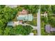 Aerial view of a well-maintained property featuring a green roof and charming outdoor spaces at 2409 Hodges Rd, Burlington, NC 27217