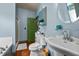 Well-lit bathroom features a custom vanity, modern toilet, and shower at 2409 Hodges Rd, Burlington, NC 27217