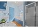 Bright bathroom with a soaking tub and separate shower featuring updated fixtures at 2409 Hodges Rd, Burlington, NC 27217