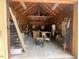 View of the garage interior showing ample workspace, storage, and potential for various projects at 2409 Hodges Rd, Burlington, NC 27217