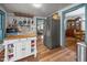 Cozy kitchen featuring butcher block island, a stainless steel refrigerator, and plenty of natural light at 2409 Hodges Rd, Burlington, NC 27217