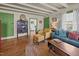 Bright living room featuring hardwood floors and a comfortable seating area at 2409 Hodges Rd, Burlington, NC 27217