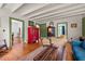 Spacious living room boasts hardwood floors, an area rug, and an open layout at 2409 Hodges Rd, Burlington, NC 27217