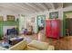 Inviting living room with a charming fireplace and exposed beam ceiling at 2409 Hodges Rd, Burlington, NC 27217