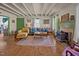Cozy living room with wood floors, wood burning stove, and neutral walls at 2409 Hodges Rd, Burlington, NC 27217